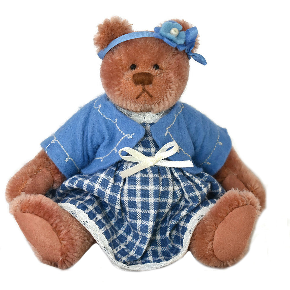 Handmade brown miniature teddy bear dressed