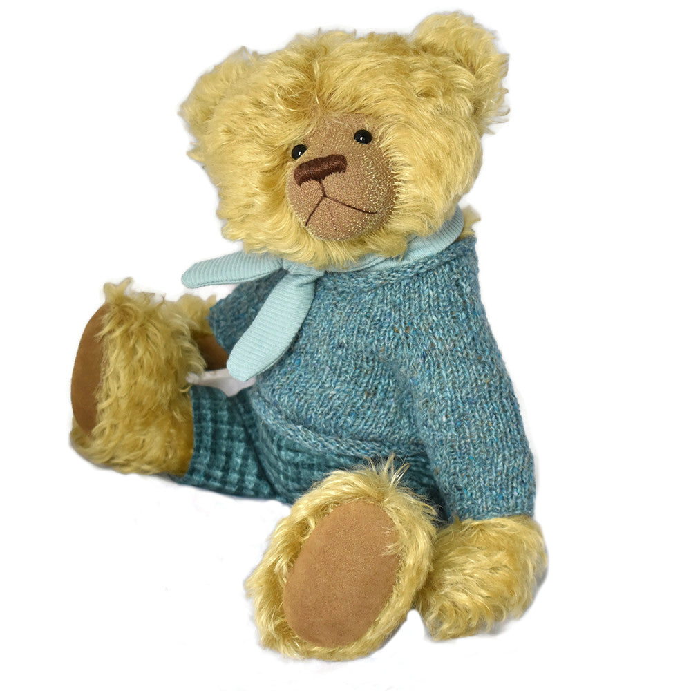 Dressed and fully jointed honey mohair bear